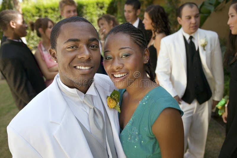 Well-dressed teenagers at school dance