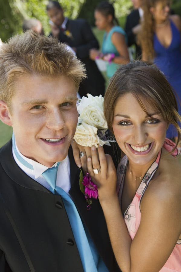 Well-dressed teenagers at school dance