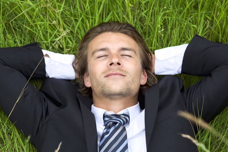 Well-dressed young businessman is resting