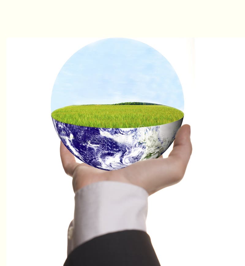 Well shaped businessman hand with green earth