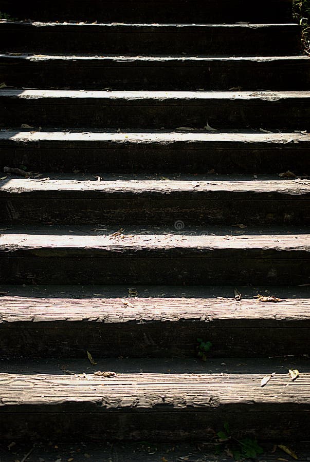 Shadows on Stairs Create Alternating Rows of Light and Dark. Stock