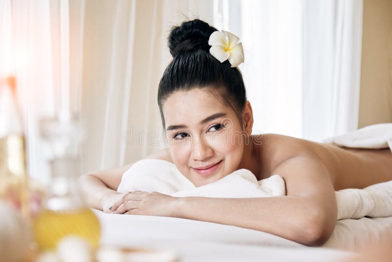 Wellness Beauty And Relaxation Concept Young Asian Woman Lying At Spa Bed Stock Image Image