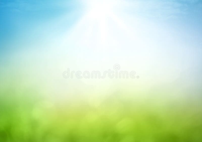 Abstract blurred beautiful green bokeh light meadow and blue sky on autumn sunrise. Abstract blurred beautiful green bokeh light meadow and blue sky on autumn sunrise.