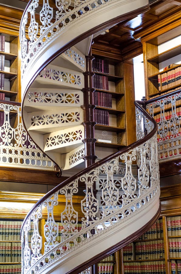 Law Library Inside the Des Moines Iowa State Capital building with ornate architecture and spiral staircase with several stories high of books. Law Library Inside the Des Moines Iowa State Capital building with ornate architecture and spiral staircase with several stories high of books.