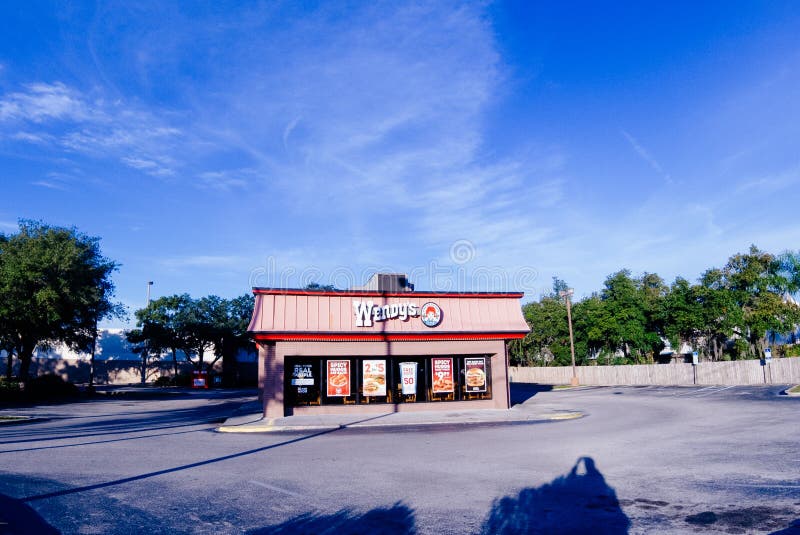 Wendy`s Fast Food Restaurant Exterior and Sign. Wendy`s is the World`s