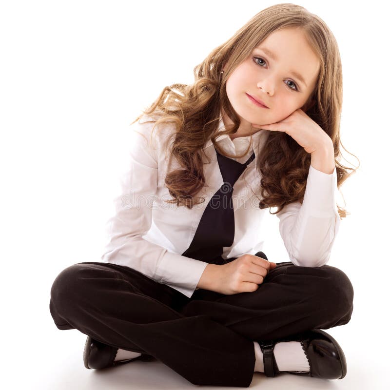 Wenig Geschäftsmädchen sitzen lizenzfreies stockbild Wenig Geschäftsmädchen sitzen lizenzfreies stockbild