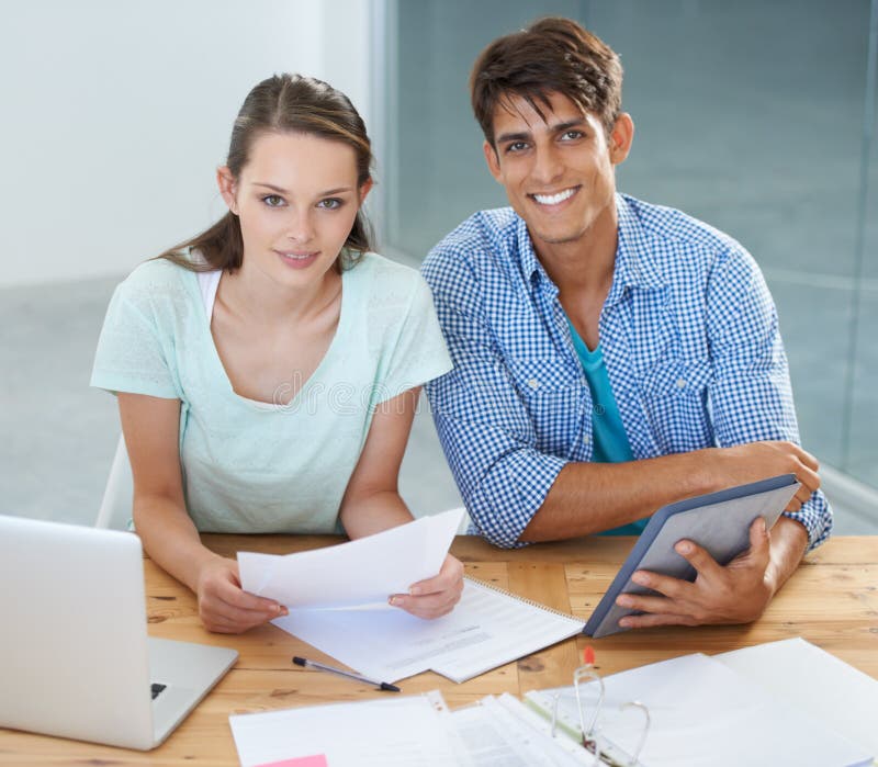 Were the Dream Team. Two Colleagues Working in the Office. Stock Photo