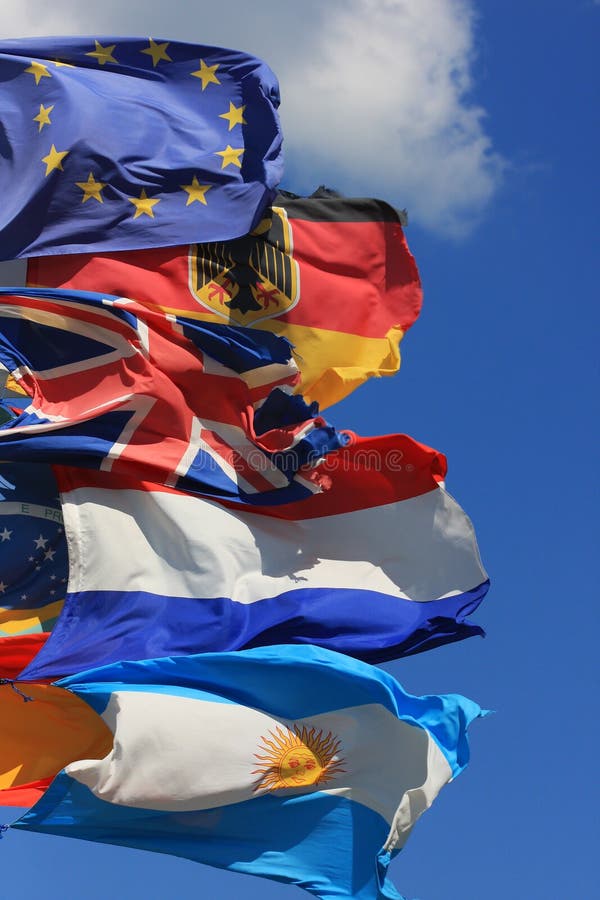 The national flags of France, UK and Germany along with the European Union flag and the Argentinian all flying together. The national flags of France, UK and Germany along with the European Union flag and the Argentinian all flying together