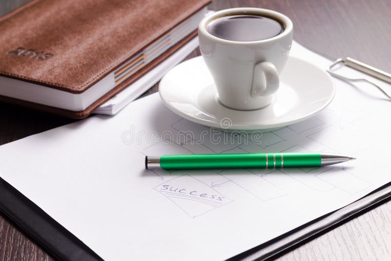 Workplace of businessman. Diary, notes and cup of coffe. Workplace of businessman. Diary, notes and cup of coffe
