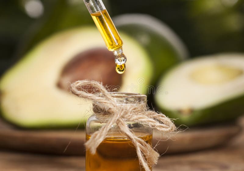 Wesentliches Schmieröl der Avocado stockfotografie