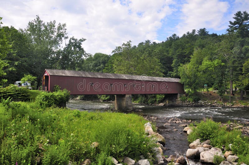 West Cornwall Connecticut Covered Bridge. The landmark West Cornwall covered bridge over the Housatonic River in West Cornwall Connecticut in the summer West Cornwall Connecticut Covered Bridge. The landmark West Cornwall covered bridge over the Housatonic River in West Cornwall Connecticut in the summer