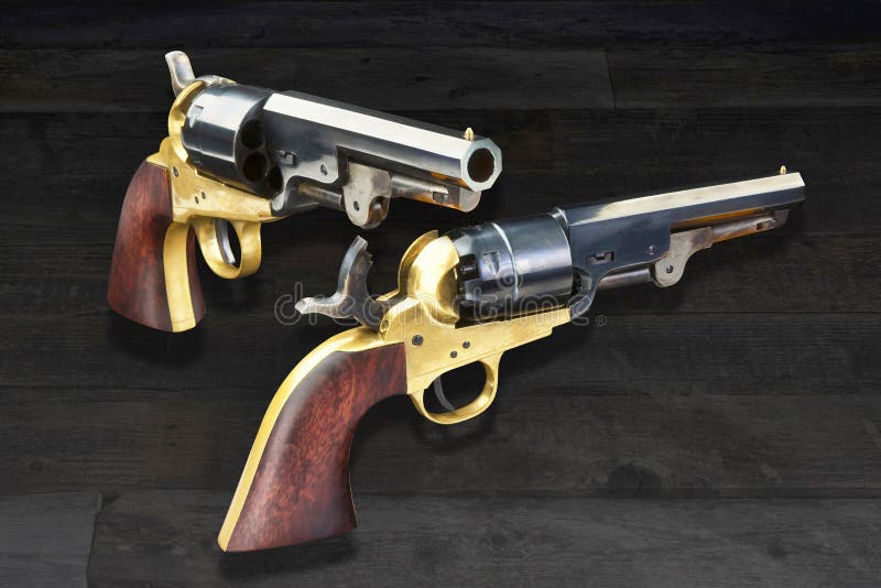 American wild west pistols called six shooters. American wild west pistols called six shooters.