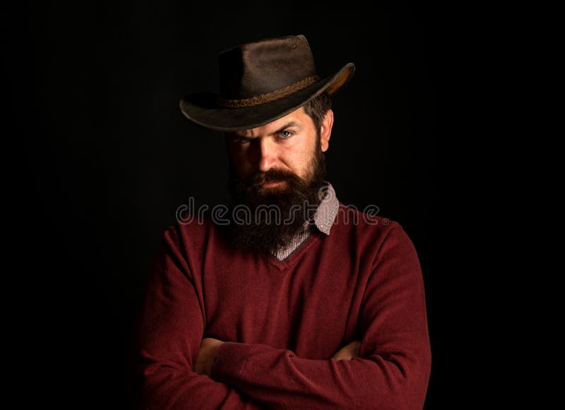 American cowboy man. Handsome brutal western guy. Cowboy with
