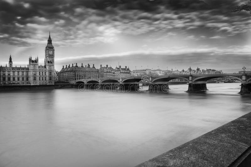 Panoramic black and white view of London city skyline looking over the river Thames to Westminster Bridge and Big Ben,, England.