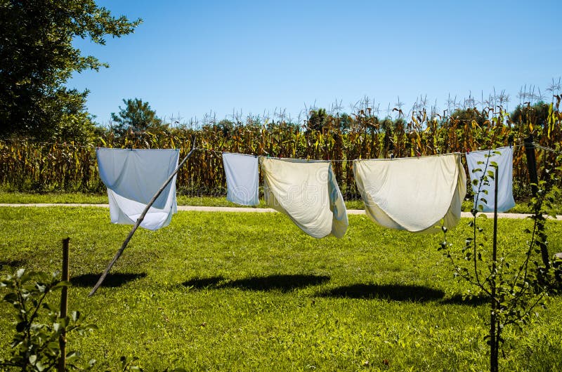 Wet Clothes Drying in the Rope Line Stock Photo Image of heaven