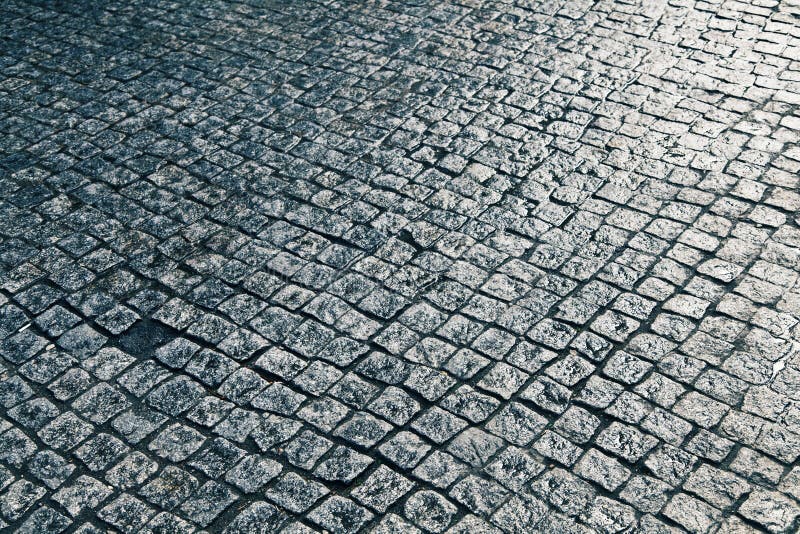 Wet Cobblestone Street