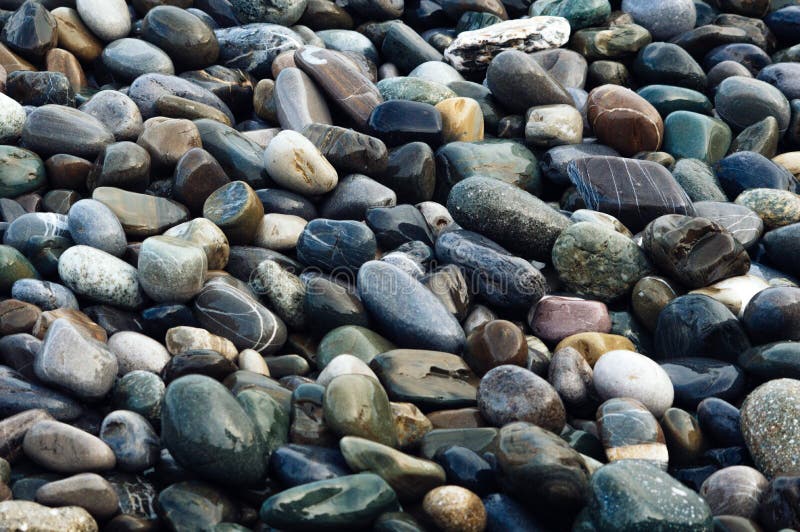 Wet colorful stones. Beautiful natural background image stock image Wet colorful stones. Beautiful natural background image stock image