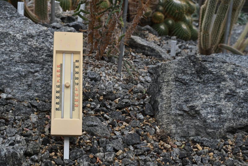 Wet and dry bulb thermometer, an instrument used to measure the relative humidity of the atmosphere. stock photography