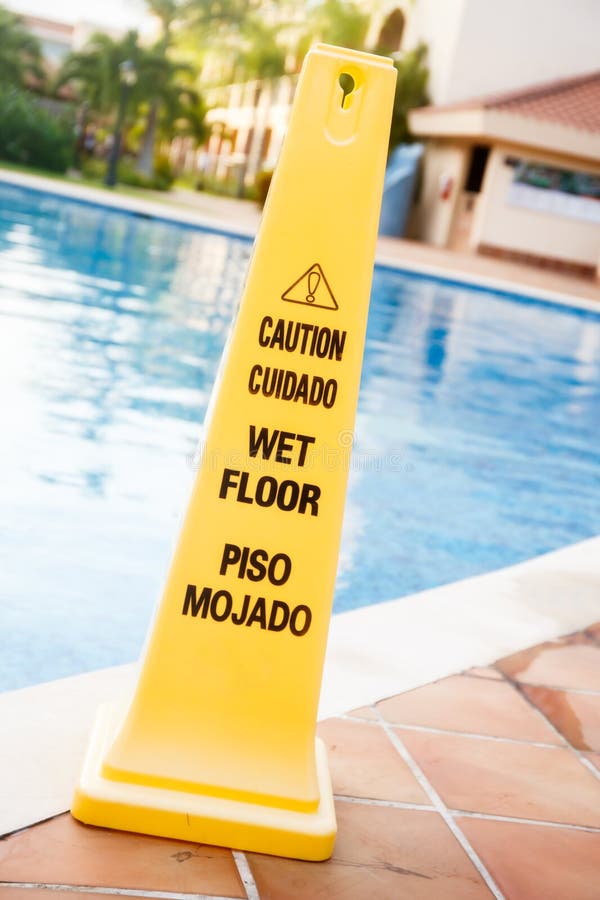 English Spanish Wet Floor Sign Stock Photos Free & RoyaltyFree Stock