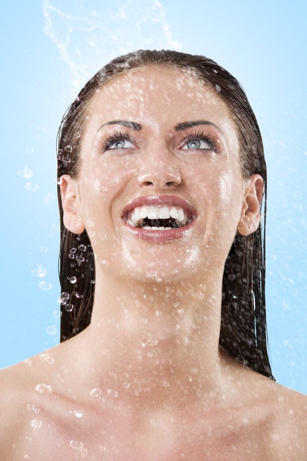 Wet girl laughing to the sky