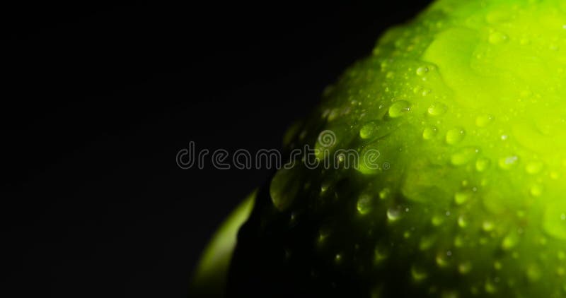 A wet green apple
