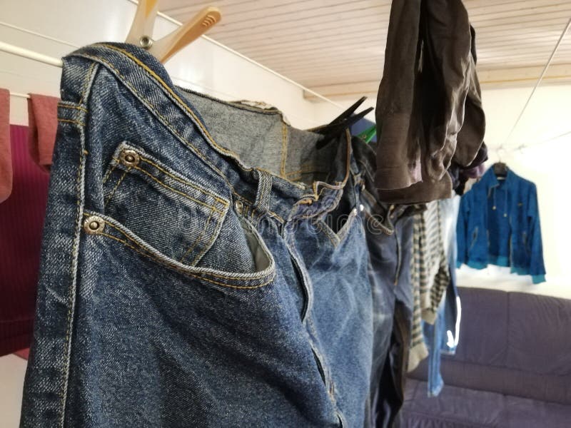 Drying Wet Clothes Hanging on Wires after Laundry Stock Photo - Image ...