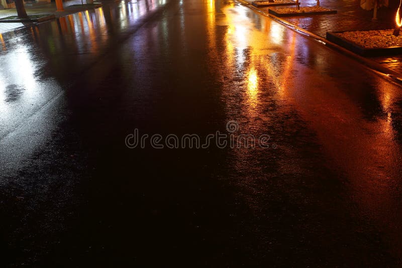 Wet night street stock photo. Image of outdoors, town 267149234