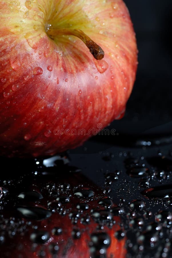 Wet red apple