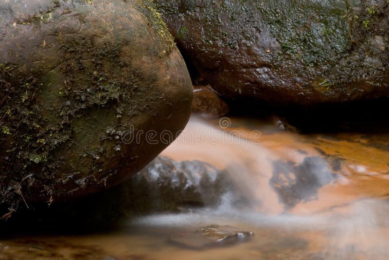 Wet rocka and water stock image. Image of smooth, outdoor 558747