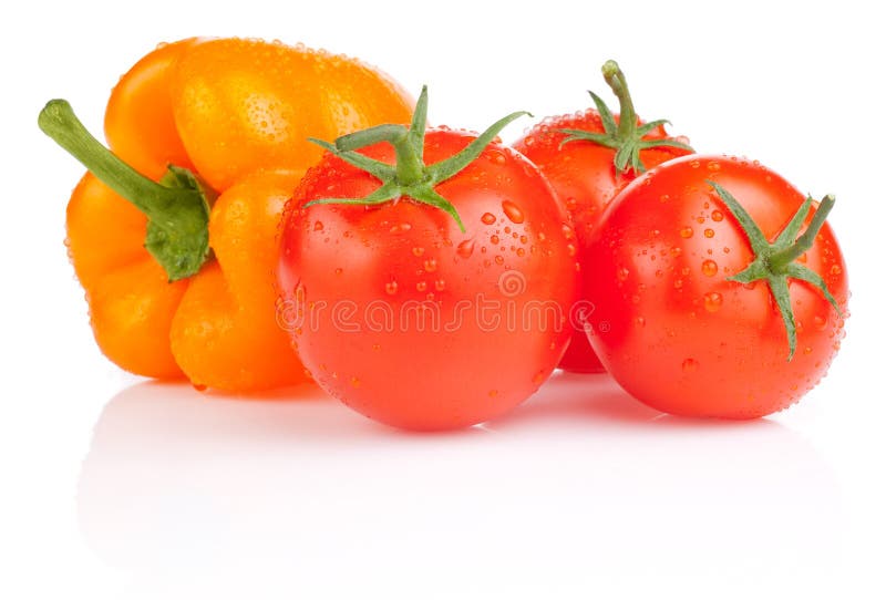 Wet Tomatoes and Yellow Bell Pepper isolated