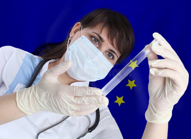 Scientist woman with test tube Coronavirus or COVID-19 against The European Union flag. Research of viruses in laboratory for prevention of a pandemic in EU. Scientist woman with test tube Coronavirus or COVID-19 against The European Union flag. Research of viruses in laboratory for prevention of a pandemic in EU