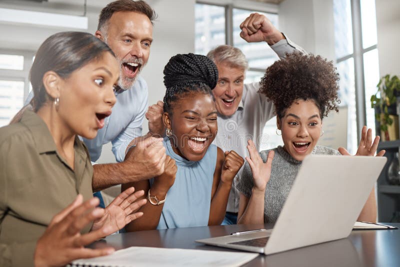 Weve got a passion for business. a group of businesspeople using a laptop at work. stock image