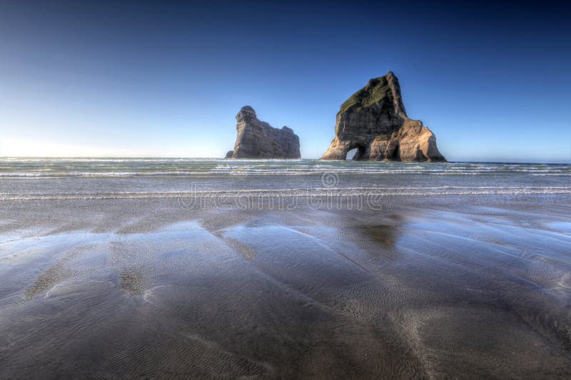 Archway Islands Near Wharariki Beach, New Zealand Stock Photo - Image ...