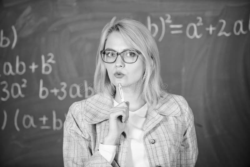 What make great teacher. Principles can make teaching more effective and more efficient. Woman teaching near chalkboard stock photo