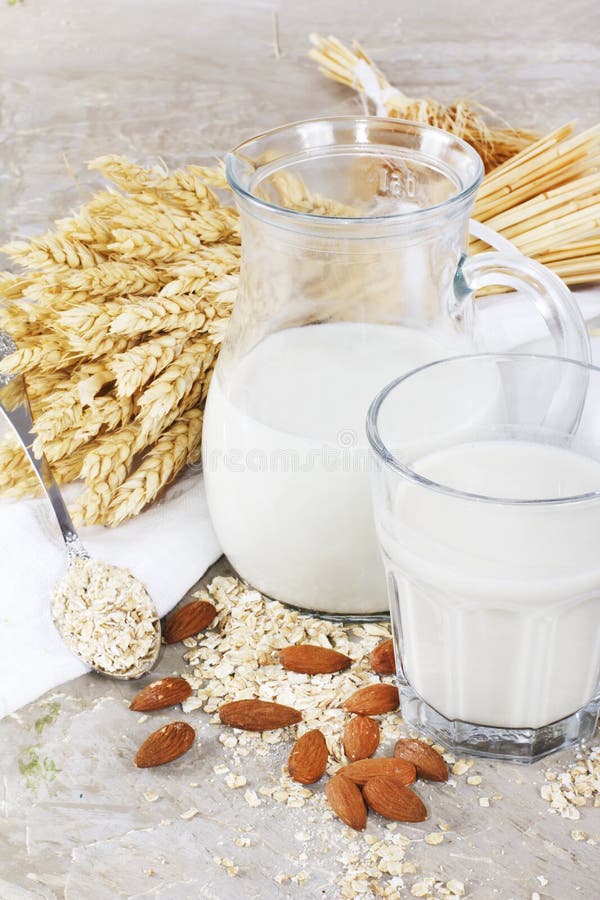 Wheat And Almond Milk With Cereals On Vintage Background Stock Photo