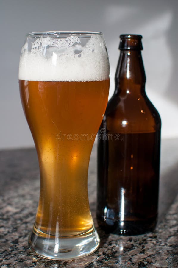 Wheat Beer Glass and Brown Bottle Stock Image Image of head, bubbles