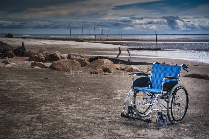 Wheel chair at the beach royalty free stock photography Wheel chair at the beach royalty free stock photography
