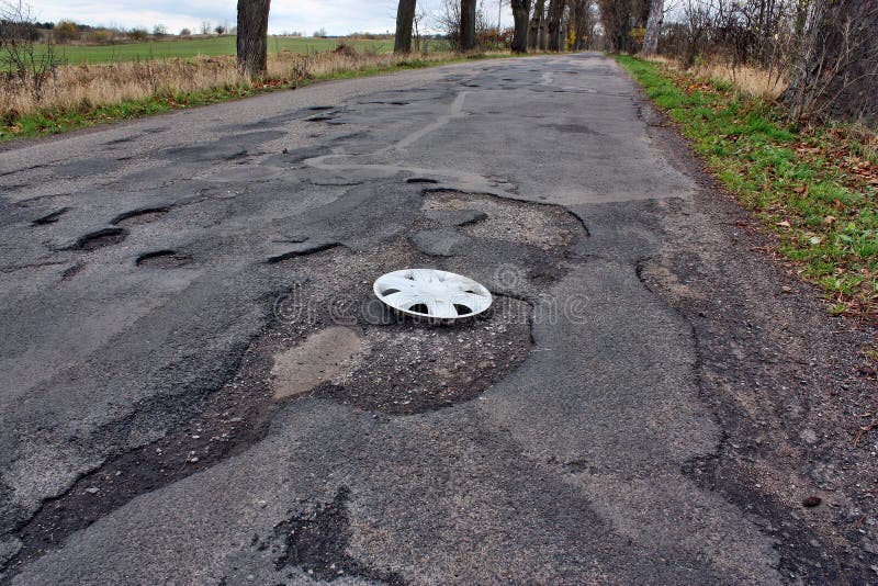Wheel Cover Clipped on the Damaged Road Stock Image Image of builder