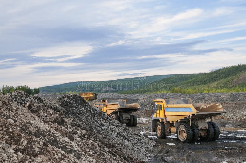 Dump Truck and Wheel Loader in Operation. Mining. Stock Image Image of geology, cargo 201989089