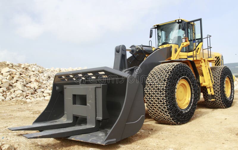 Wheel loader on a stone mine royalty free stock photo