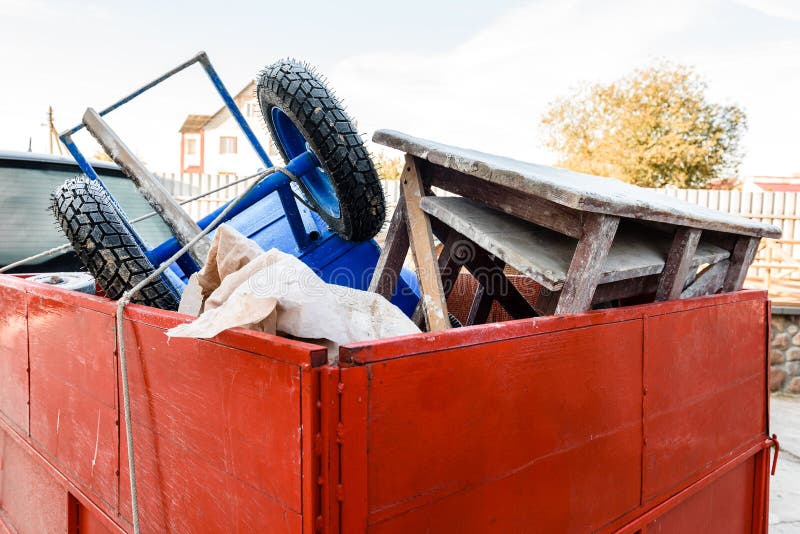 Wheelbarrow and Construction Table Loaded into a Car Trailer Stock