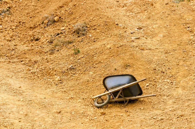 Wheelbarrow and Dirt stock image. Image of cart, wheelbarrow 34939871