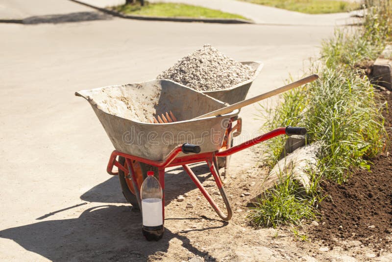 Wheelbarrow with Gravel at the Construction Site Stock Image Image of