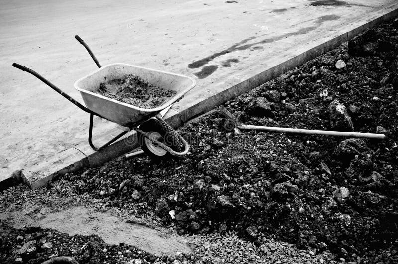 Wheelbarrow and shovel stock photo. Image of street, tool - 19393618