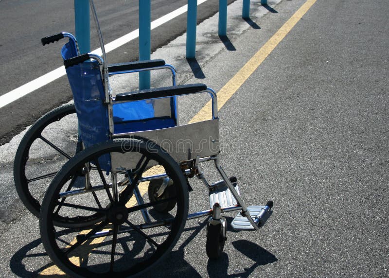 Wheelchair in parking lot stock photo. Image of walking 773724