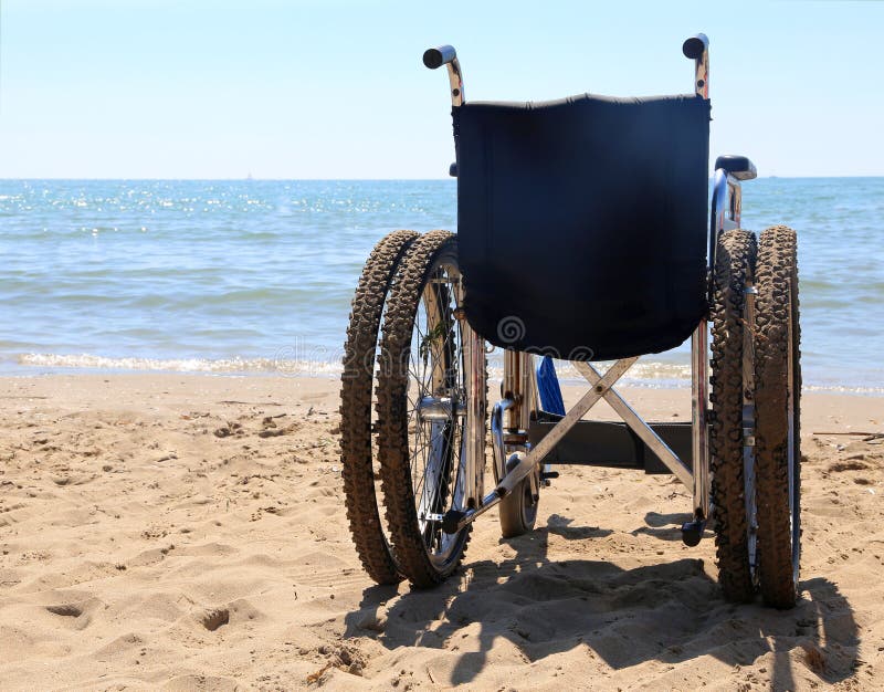 Wheelchair on the Sand of the Beach Stock Image Image of quadriplegic