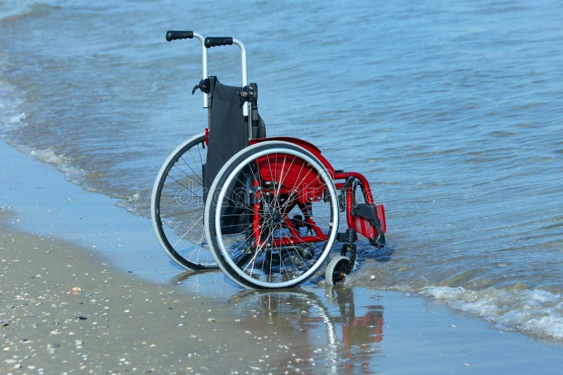 Red Wheelchair Sandy Beach Summer Stock Photos Free & RoyaltyFree