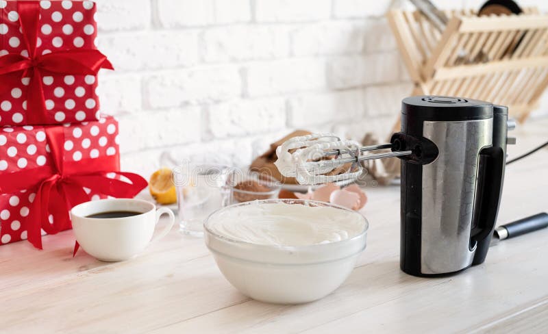 https://thumbs.dreamstime.com/b/whipped-cream-egg-whites-perfect-peaks-glass-bowl-baking-concept-mixer-wooden-white-table-meringue-recipe-199470485.jpg