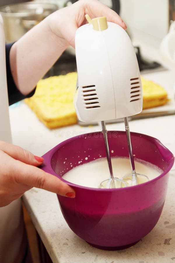 Whipping cream mixer stock image. Image of mixing, cooking 56925569