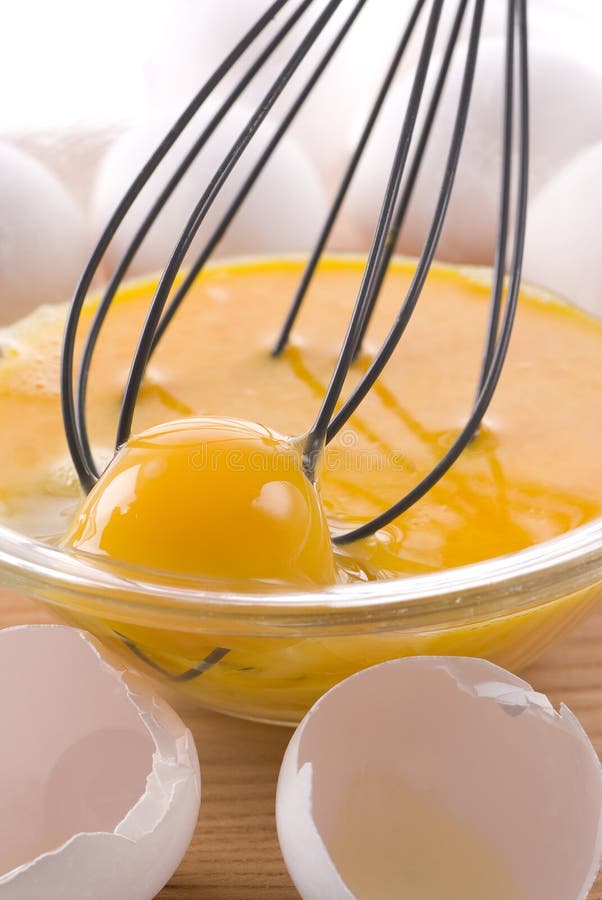 Whipping Eggs stock image. Image of close, yolk, ingredient 12950889